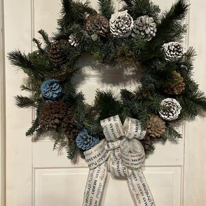 27” grapevine wreath w/artificial greenery, natural pine cones & bow wreath